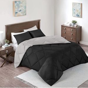 Comforter & two matching shams reversible set -black and grey. Full/Queen size